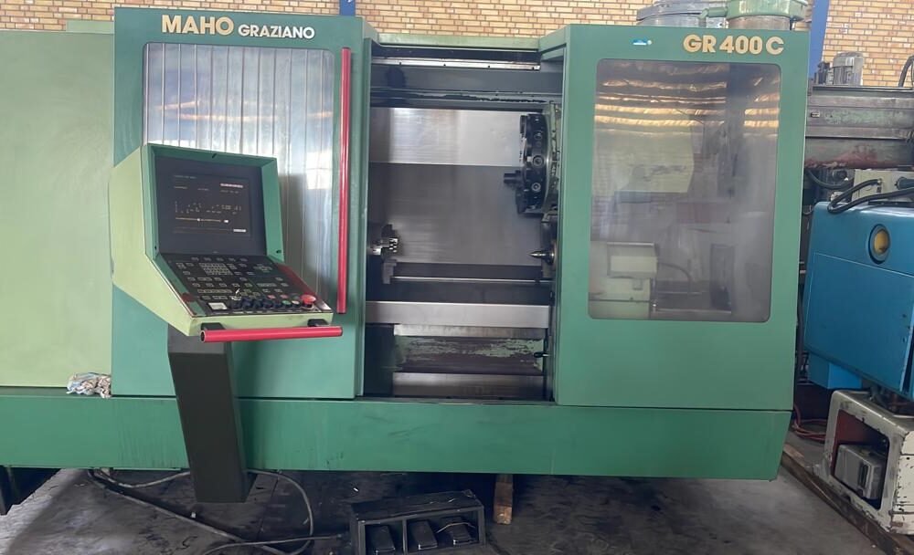 تراش CNC ماهو (MAHO Graziano) – قطر کارگیر ۴۵۰ میلی‌متر – طول کار ۱۰۰۰ میلی‌متر – کنترل Siemens 802 – استارت آماده کار – وضعیت بسیار سالم و تمیز